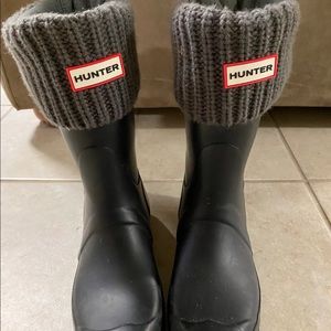 Mid calf hunter boots and knit socks